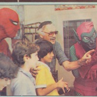 Stan Lee and kids play Spider-Man, a home video game cartridge for the VCS/2600, 1983