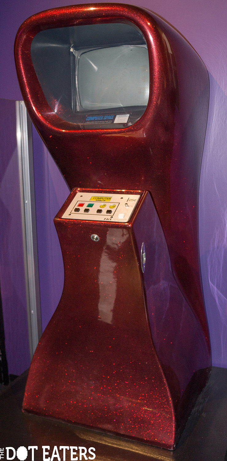 Image of a red Computer Space cabinet, a coin-op video game by Syzygy/Nutting Associates 1971