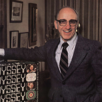 Ralph Baer and an Odyssey box, a home video game system by Magnavox 1972