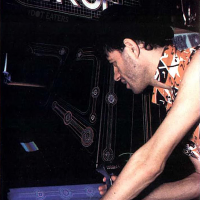 Bob Geldof playing Tron, an arcade video game by Bally-Midway 1982